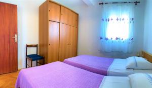 Postel nebo postele na pokoji v ubytování Roko apartment house