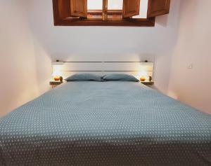 Postel nebo postele na pokoji v ubytování Alma Canaria Rooms