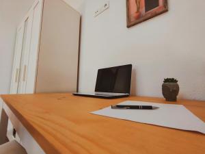 TV a/nebo společenská místnost v ubytování Alma Canaria Rooms