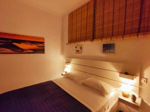 Postel nebo postele na pokoji v ubytování Alma Canaria Rooms