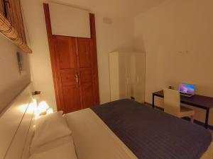 Postel nebo postele na pokoji v ubytování Alma Canaria Rooms