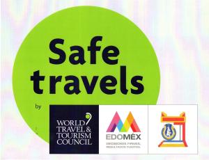 a sign that reads safe travels and a world travel tourism council at Hotel Casa de la Luna in San Juan Teotihuacán