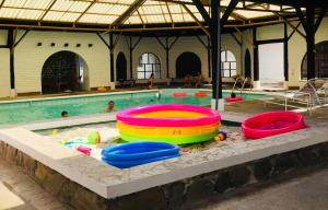 Bazén v ubytování Hotel y Hosteria Natabuela nebo v jeho okolí