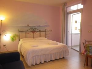 Voodi või voodid majutusasutuse Elisart Guest House toas