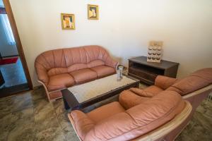 A seating area at Toscana Apartman