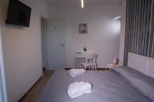 Postel nebo postele na pokoji v ubytování Largo Sicilia B&B