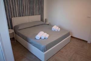 Postel nebo postele na pokoji v ubytování Largo Sicilia B&B