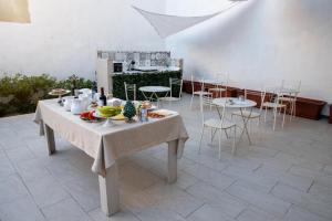Reštaurácia alebo iné gastronomické zariadenie v ubytovaní Largo Sicilia B&B