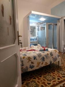A bed or beds in a room at Casa privata vacanze Relax piazza Maria Anania vico n4