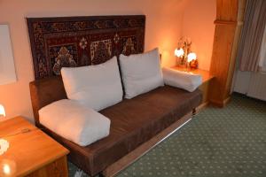 Tempat tidur dalam kamar di Hotel-Restaurant Fischer