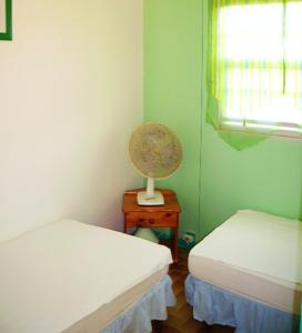 Postel nebo postele na pokoji v ubytování Maison charmante Sainte-Luce