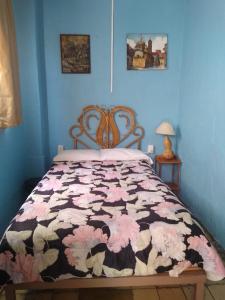 Rúm í herbergi á Hostal don Felipe