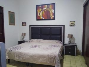 Rúm í herbergi á Hostal don Felipe