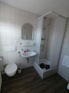Ванная комната в Hotel Villa Fröhlich
