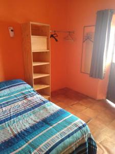 Rúm í herbergi á Hostal don Felipe