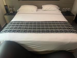 Postel nebo postele na pokoji v ubytování Motel Pedregal