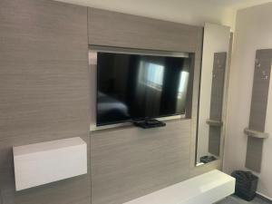 TV a/nebo společenská místnost v ubytování Motel Pedregal + 22 fotografií