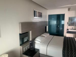 Postel nebo postele na pokoji v ubytování Motel Pedregal