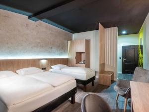 Katil atau katil-katil dalam bilik di ibis Styles Dresden Neustadt