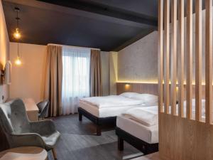 Katil atau katil-katil dalam bilik di ibis Styles Dresden Neustadt