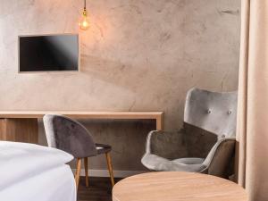 Televisyen dan/atau pusat hiburan di ibis Styles Dresden Neustadt