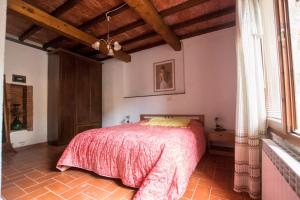 Posteľ alebo postele v izbe v ubytovaní Apartment immersed in the green of the Maremma