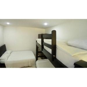 a room with two bunk beds in it at Holiday home in Gaira in Santa Marta
