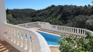 A view of the pool at Casa da Tranquilidade with private pool in tranquil setting or nearby