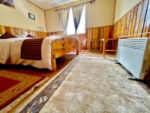 Ein Bett oder Betten in einem Zimmer der Unterkunft Panorama Lodge and Restaurant