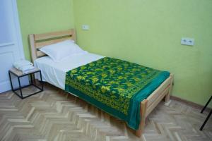 Postel nebo postele na pokoji v ubytování Sunflower Hotel