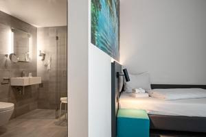 Koupelna v ubytování Hotel Amper