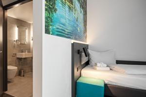 Koupelna v ubytování Hotel Amper