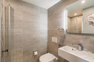 Koupelna v ubytování Hotel Amper