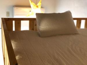 Postel nebo postele na pokoji v ubytování Hostel Yume-Nomad Kobe