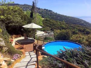 Utsikt över poolen vid Great Pelion Villa Villa Selini 4 bedrooms Private Pool Aghios Georgios eller i närheten