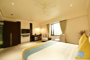 HOTEL CYPRESS客房内的一张或多张床位