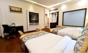 TV a/nebo společenská místnost v ubytování Bravura Gold Resort