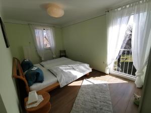 A bed or beds in a room at Ferienwohnung Morgensonne