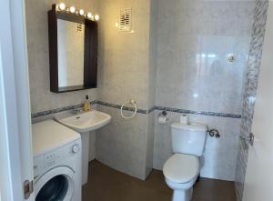 Koupelna v ubytování Apartamento con gran terraza cerca de la playa