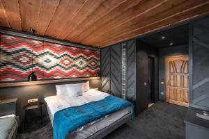 Postel nebo postele na pokoji v ubytování Stara Pravda Hotel - Vykrutasy