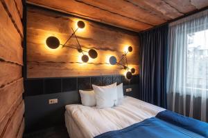 Postel nebo postele na pokoji v ubytování Stara Pravda Hotel - Vykrutasy
