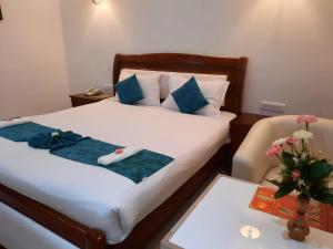 Voodi või voodid majutusasutuse Hotel SS Palace toas