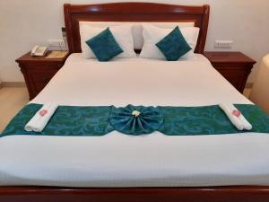 Voodi või voodid majutusasutuse Hotel SS Palace toas