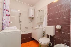 Koupelna v ubytování Apartment Mirela + 4 fotografie