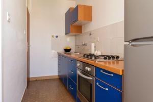Kuchyň nebo kuchyňský kout v ubytování Apartment Mirela