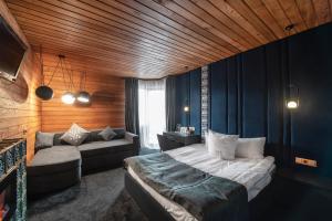 Postel nebo postele na pokoji v ubytování Stara Pravda Hotel - Vykrutasy