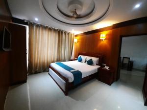 Katil atau katil-katil dalam bilik di Hotel ss Grand