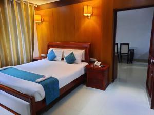 Voodi või voodid majutusasutuse Hotel SS Palace toas