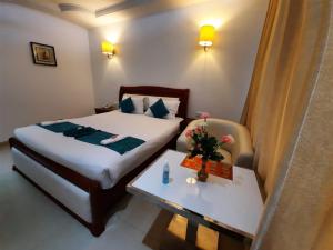 Voodi või voodid majutusasutuse Hotel SS Palace toas