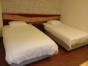 知本正好運溫泉民宿 房間的床